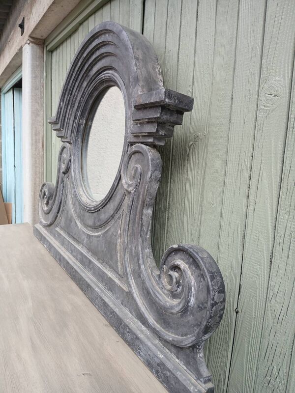 Miroir en bois forme œil de boeuf
