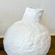 Sculptural vase with a mineral Boho spirit.