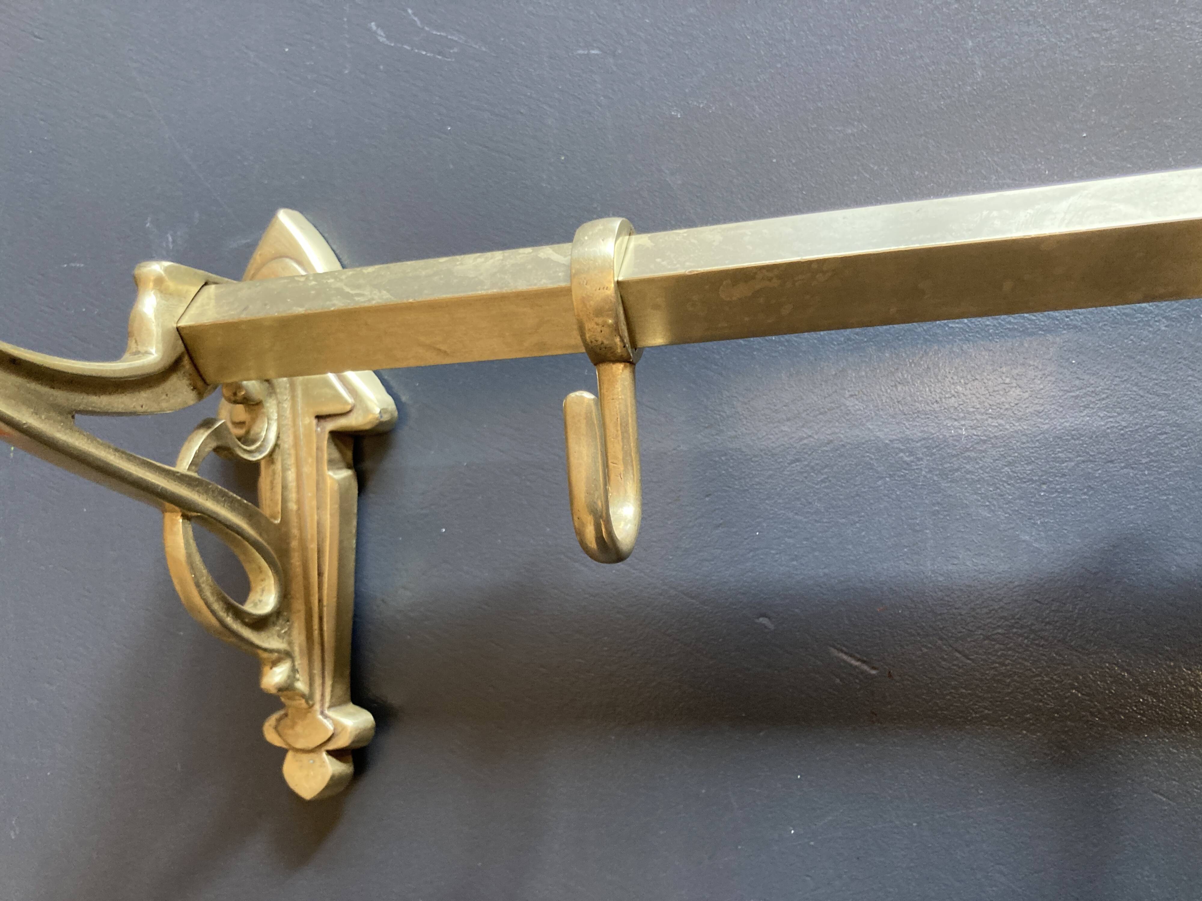 Art-deco wall-mounted coat rack in brass