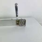 Wall-mounted coat rack, strip of 3 aluminium hooks from the 1960s.