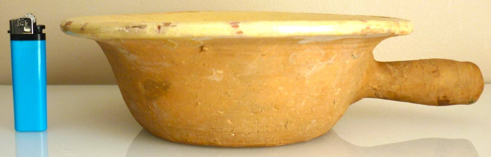 Frying pan, old caquelon, yellow glazed earthenware from the south of France.