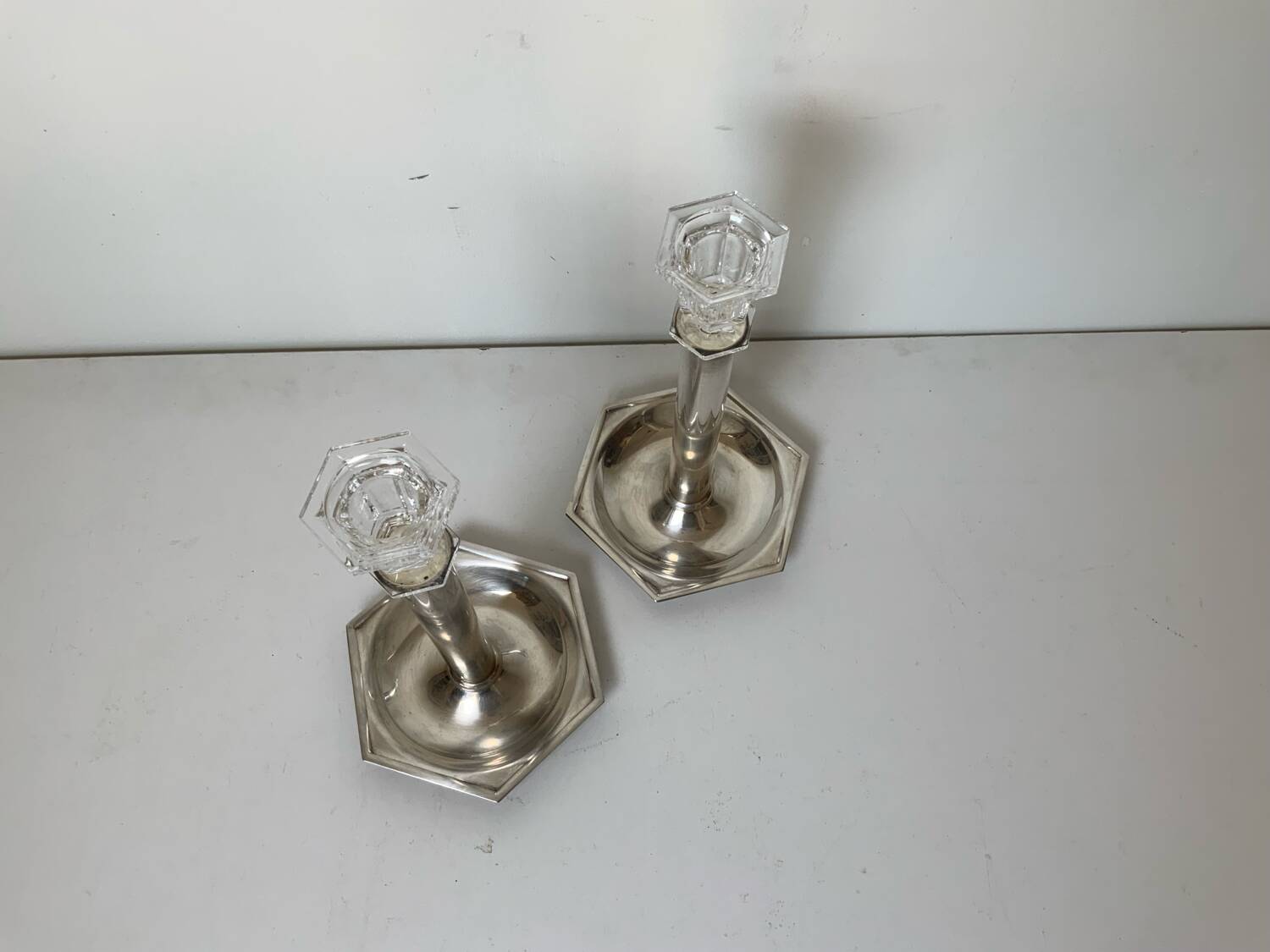 Pair of silver-plated metal candlesticks
