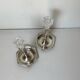 Pair of silver-plated metal candlesticks