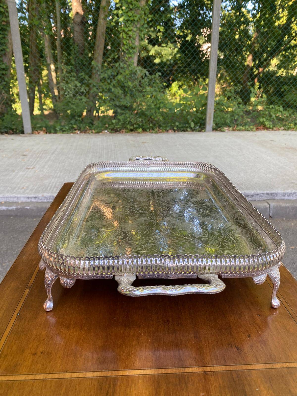 Sculpted silver serving tray