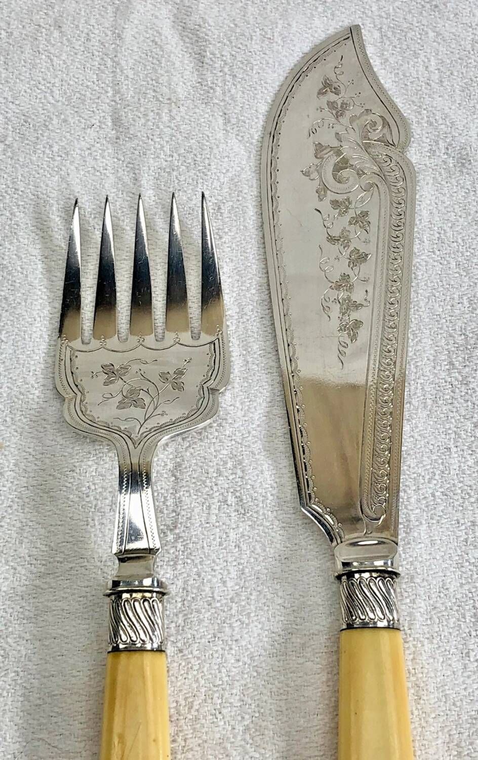 Antique Victorian fish serving cutlery, bone and silver-plated metal