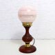 Turned wood and pink glass lamp