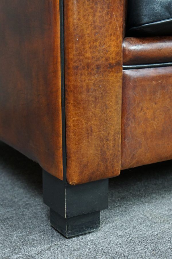 2.5-seater art deco style sofa in sheepskin