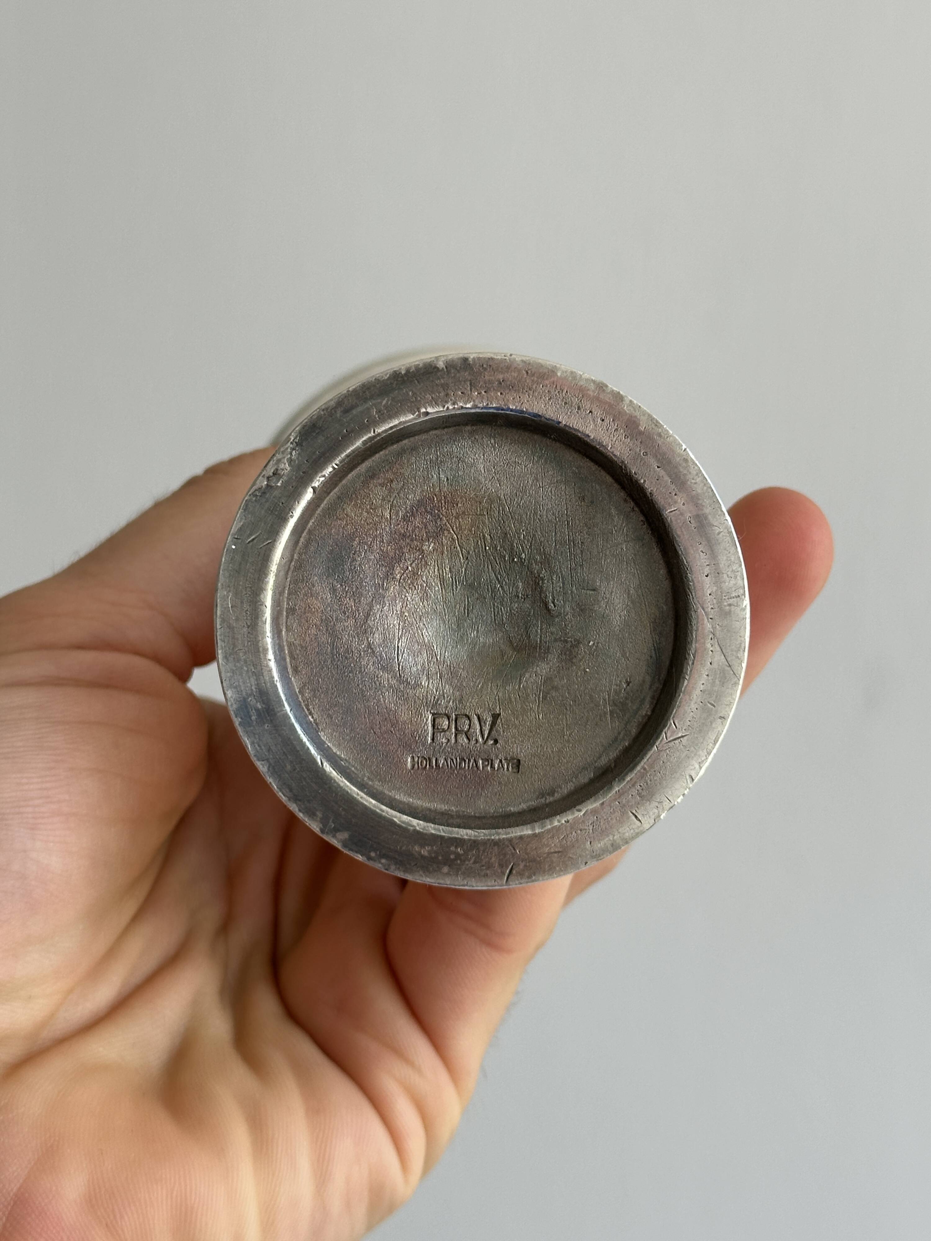 antique vase in shiny silver metal