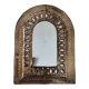 Small golden metal mirror in oriental style.