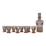Glasses and carafe decorated with red Christmas reindeer and white granita 60's