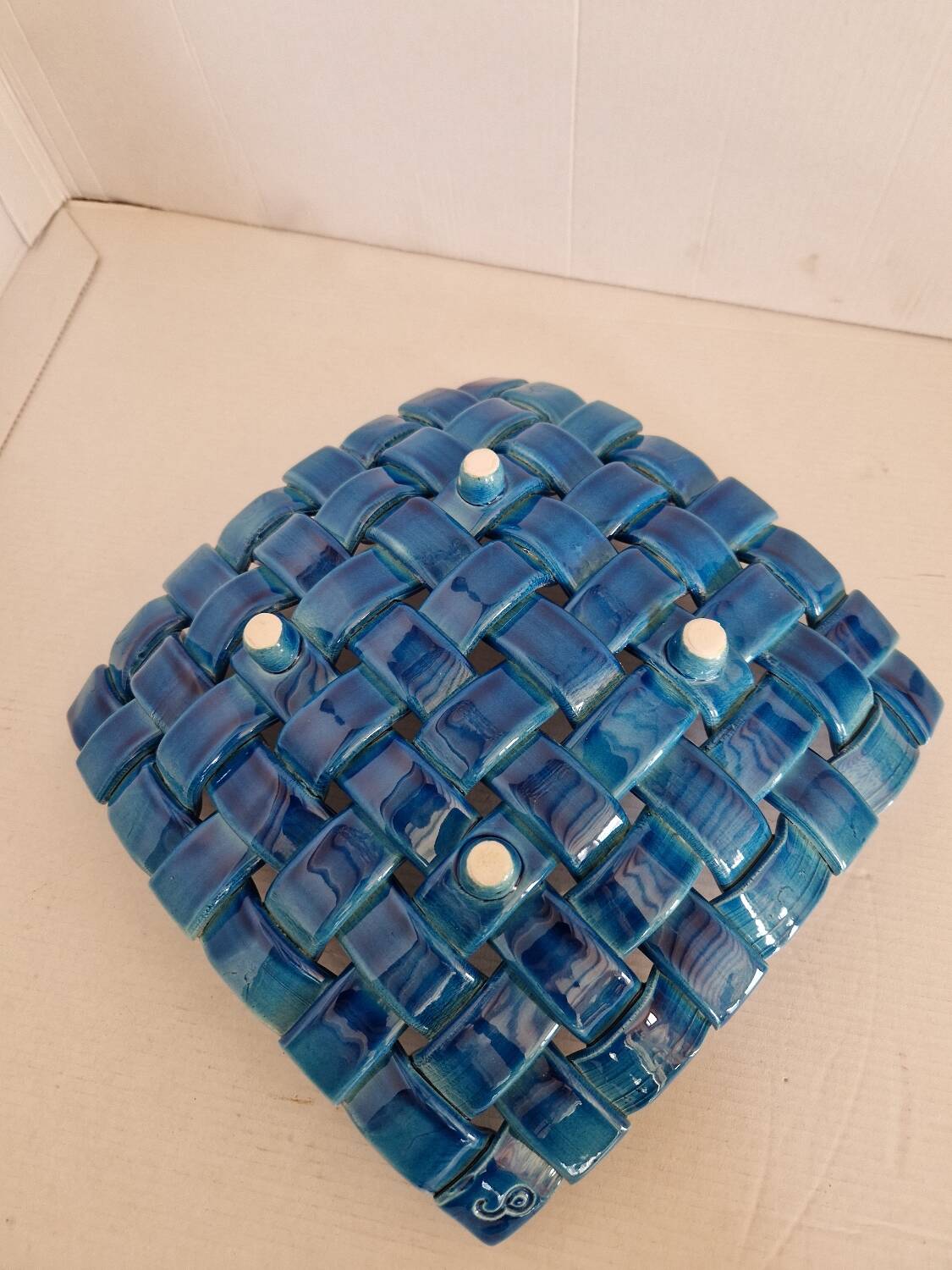 Antique woven ceramic fruit basket