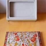 Porcelain box on claw feet