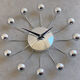 Chrome Karlsson spider wall clock with black hands, sputnik space age