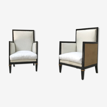 Pair of blackened wooden armchairs