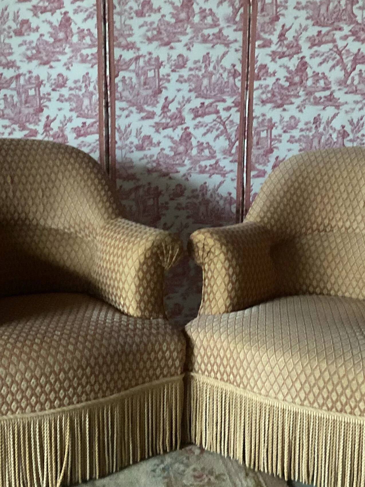Pair of renovated upholstered frog chairs in beige velvet.