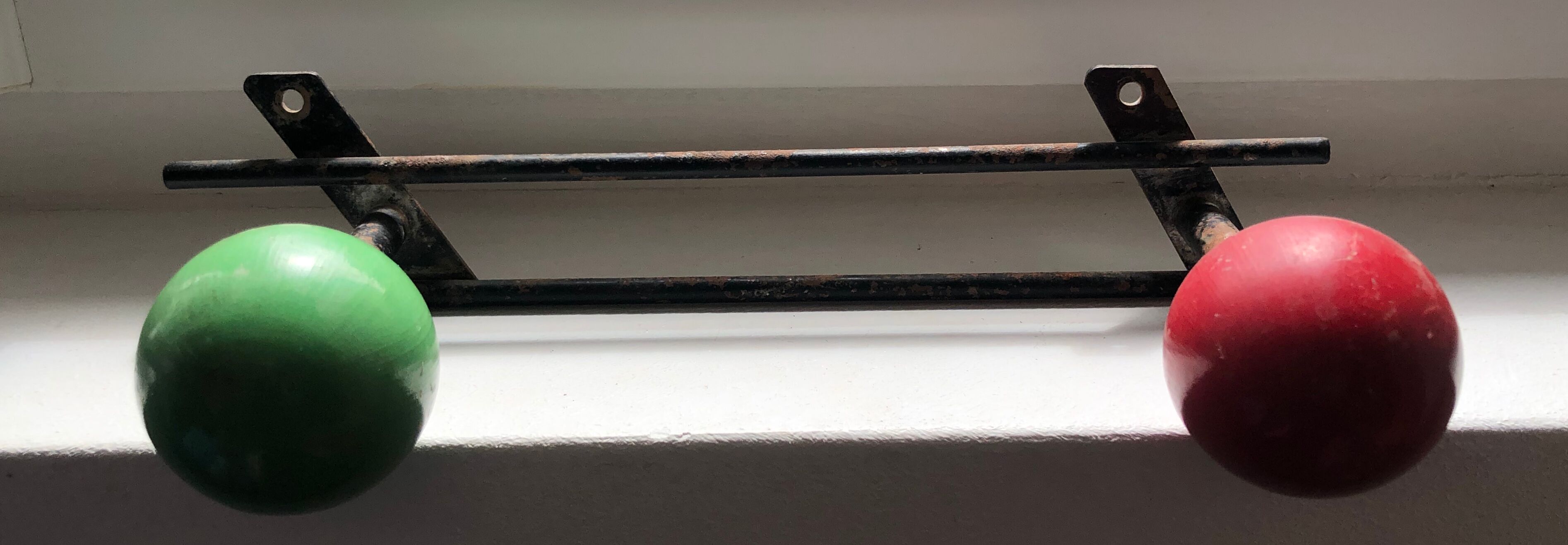 Patère two vintage balls wears old coat