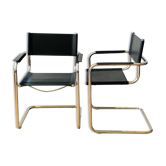 Paire de fauteuils tubulaires en métal et cuir