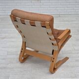 Fauteuil norvégien des années 1970, modèle "Kengu", cuir de meuble.