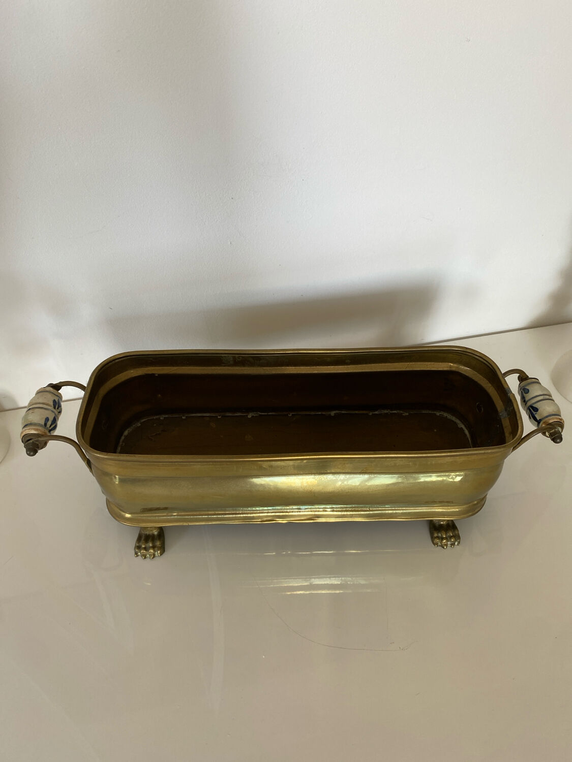 Antique brass planter with porcelain handles