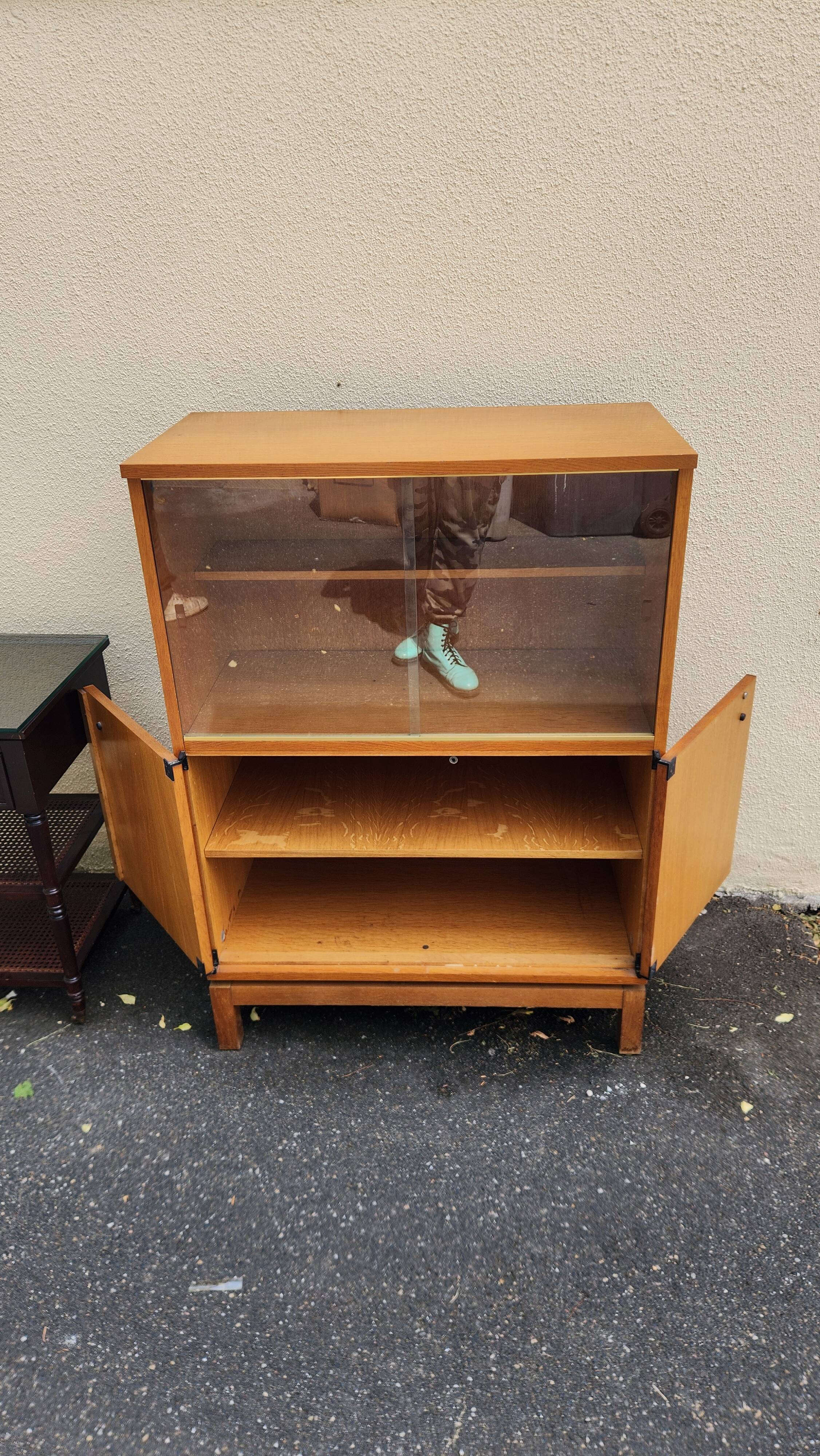 Glass-fronted buffet design by Marcel Gascoin, Alvéole Edition, 1950s.