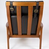 Easy chair with stool in teak upholstered with black leather design Arne Wahl Iversen