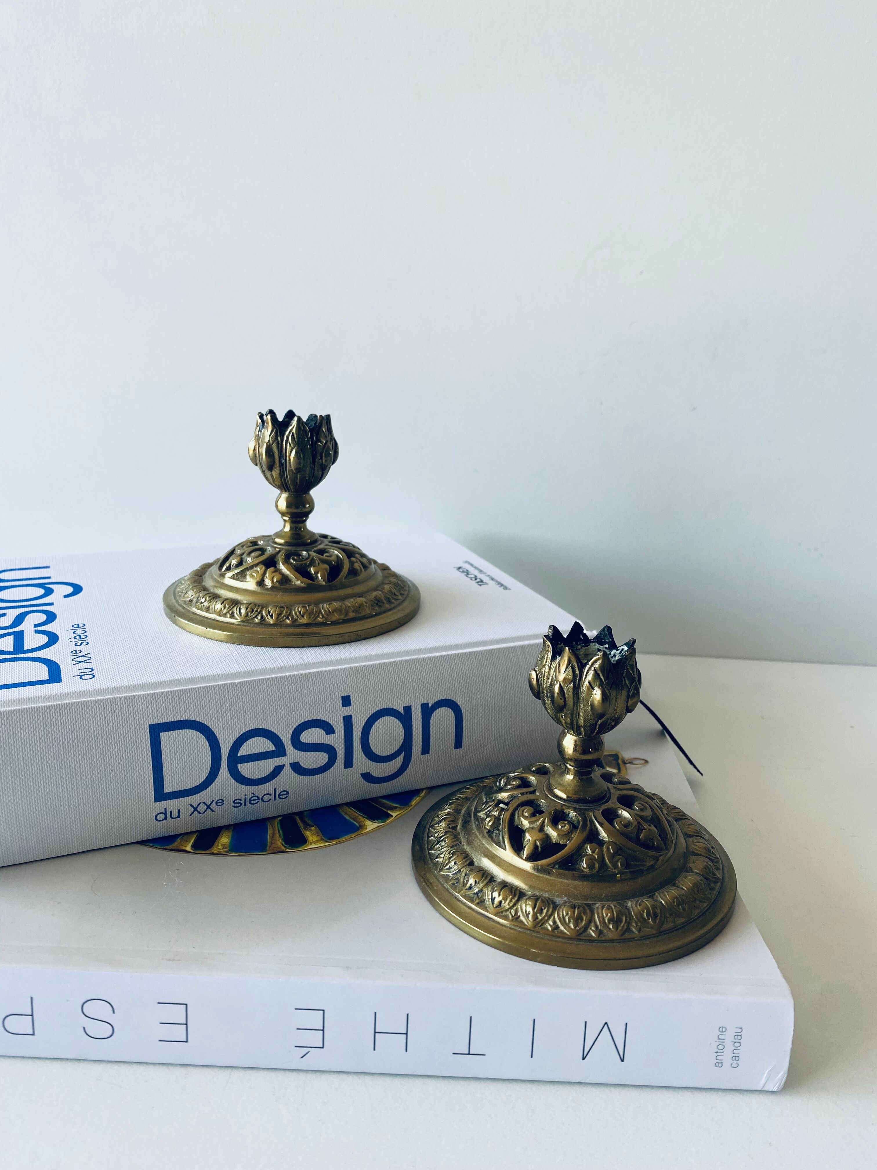 Pair of bronze candle holders signed