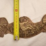 Bronze pediment