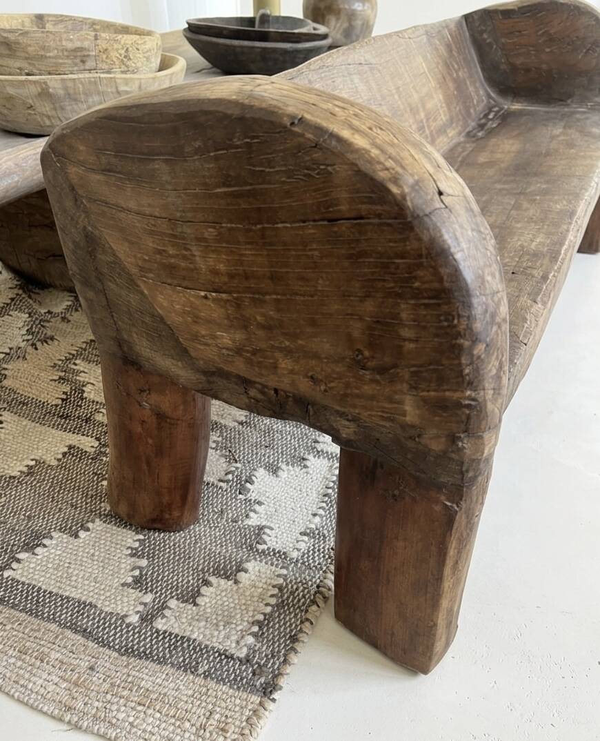 Traditional monoxyle bench in solid Indian wood.
