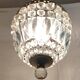 Lustre montgolfière bronze doré et pampilles en cristal