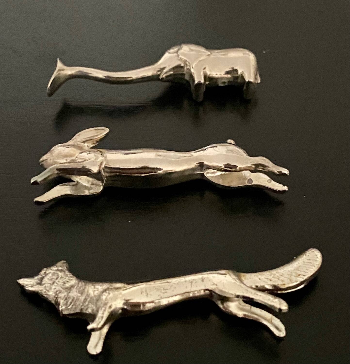 6 various animal shaped knife holders in silver metal