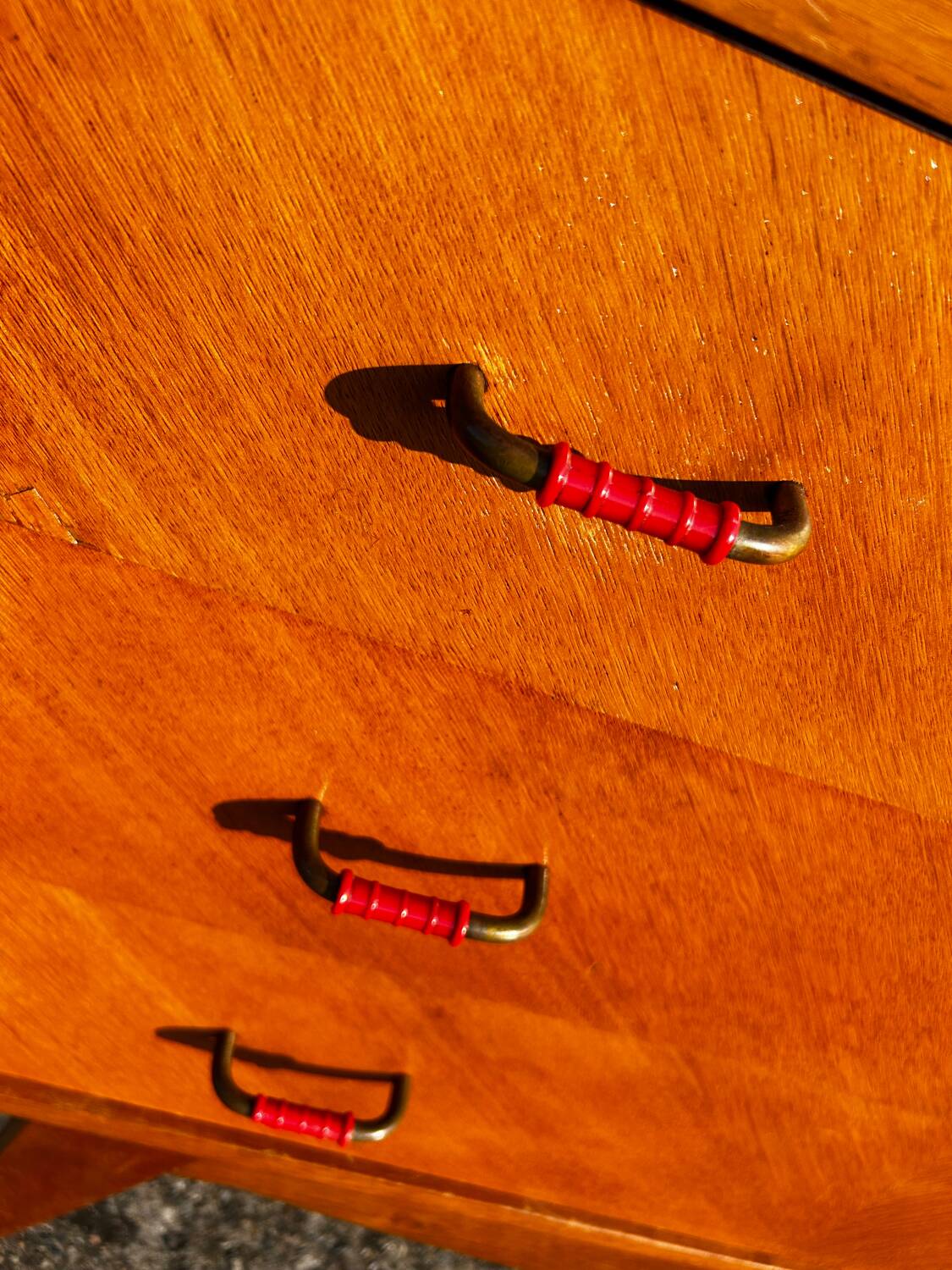 Vintage chest of drawers with compass feet.