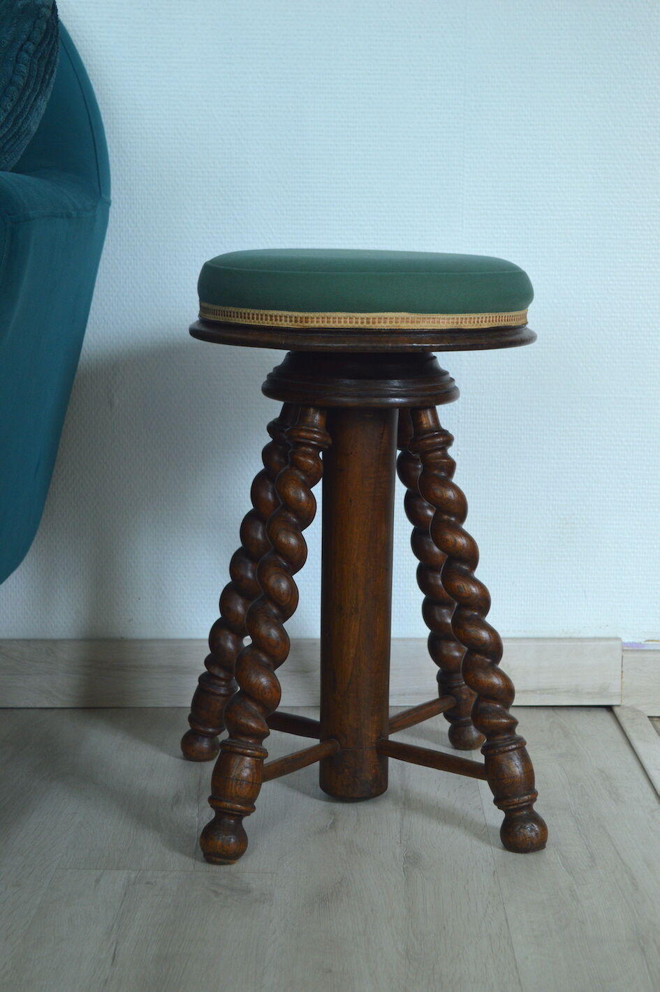 Antique piano stool with adjustable screws and turned wooden legs