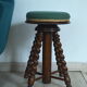 Antique piano stool with adjustable screws and turned wooden legs