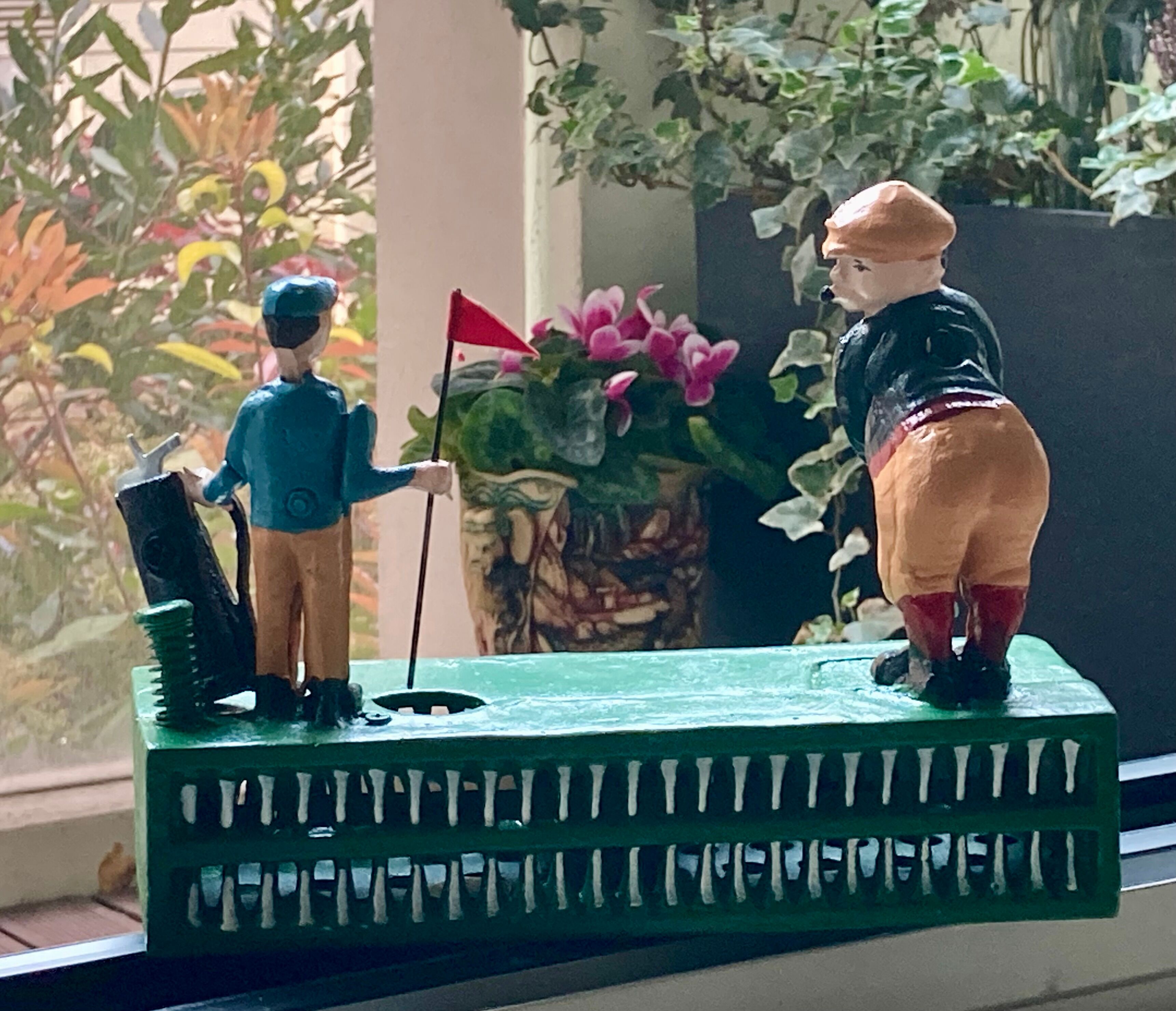 Mechanical piggy bank - golfers - vintage