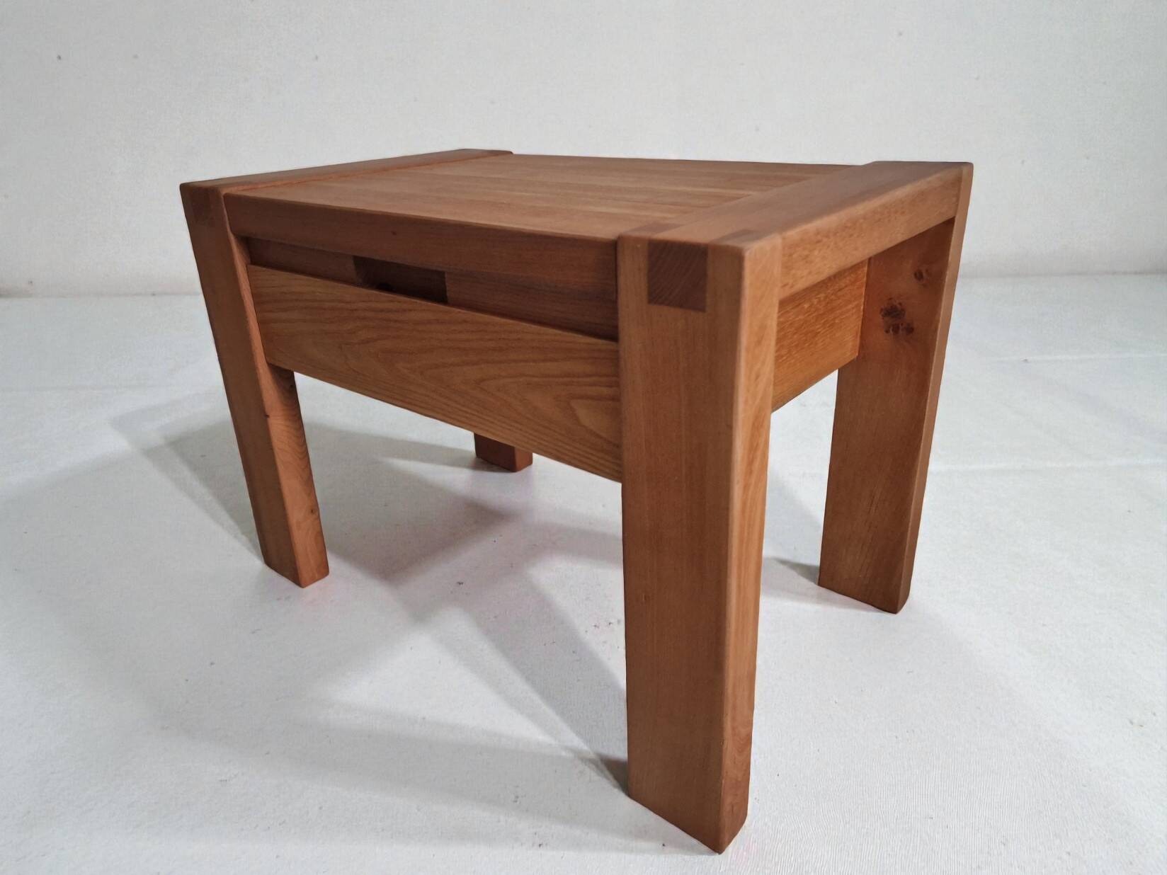 Monopoly-style elm bedside table regain