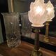 Table lamp with brass base and vintage flame globe