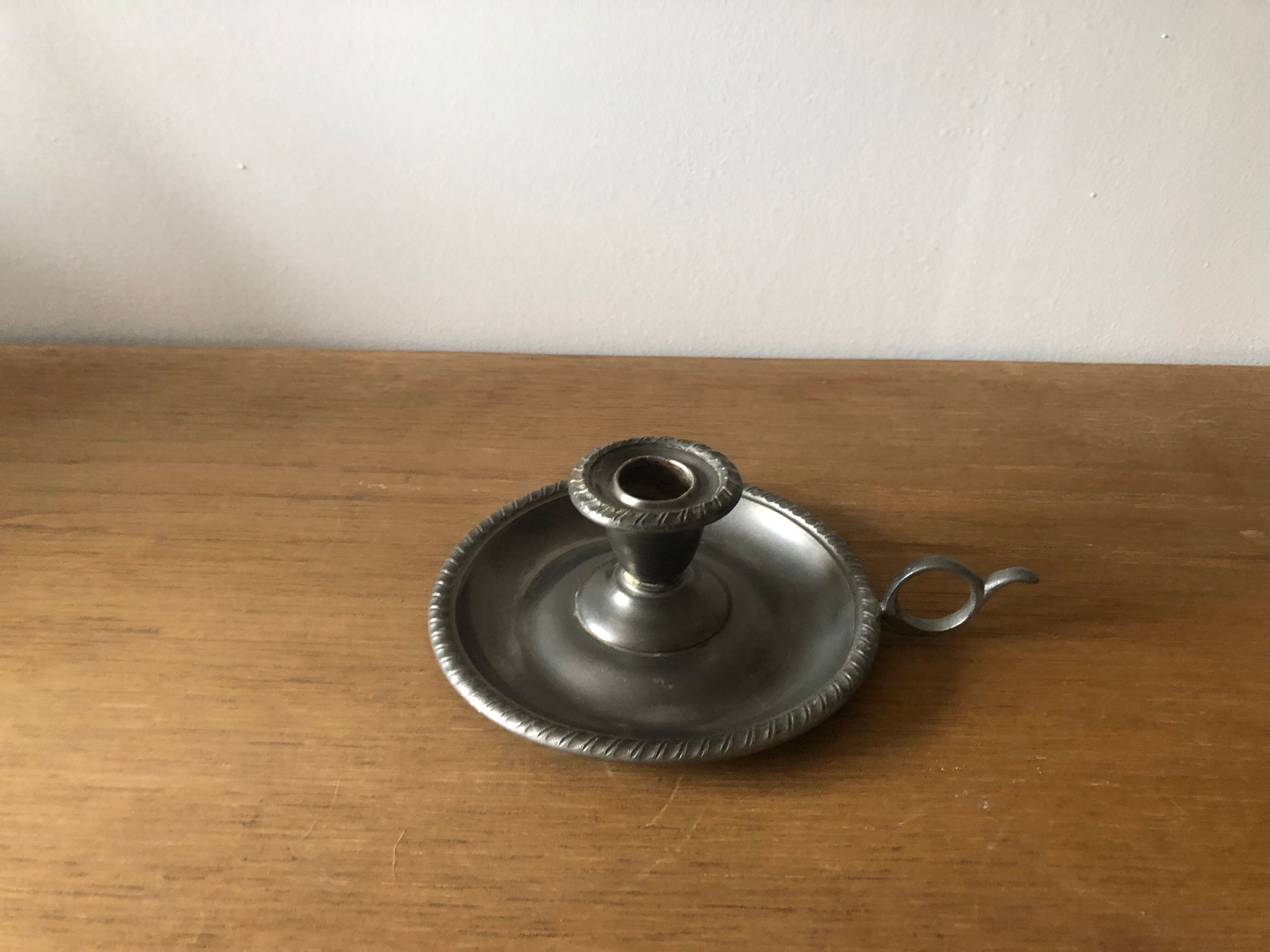 Tin hand candle holder