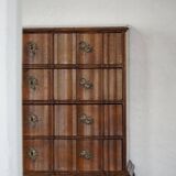 Antique baroque oak commode from the late 18th century with cabriole legs.