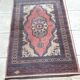 Rectangular oriental rug 153 x 91 cm