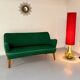 Old vintage green cocktail bean sofa from the 50s