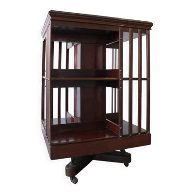 Bibliothèque tournante en acajou, style régence, début XXème.