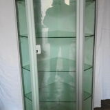 Painted metal ophthalmologist's corner display case, early 20th century