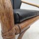 1970s, Danish armchair, rattan, black artificial leather.