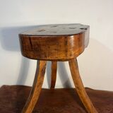Brutalist oak stool with curved legs, handcrafted