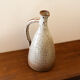 Pitcher in sandstone Roger Jacques