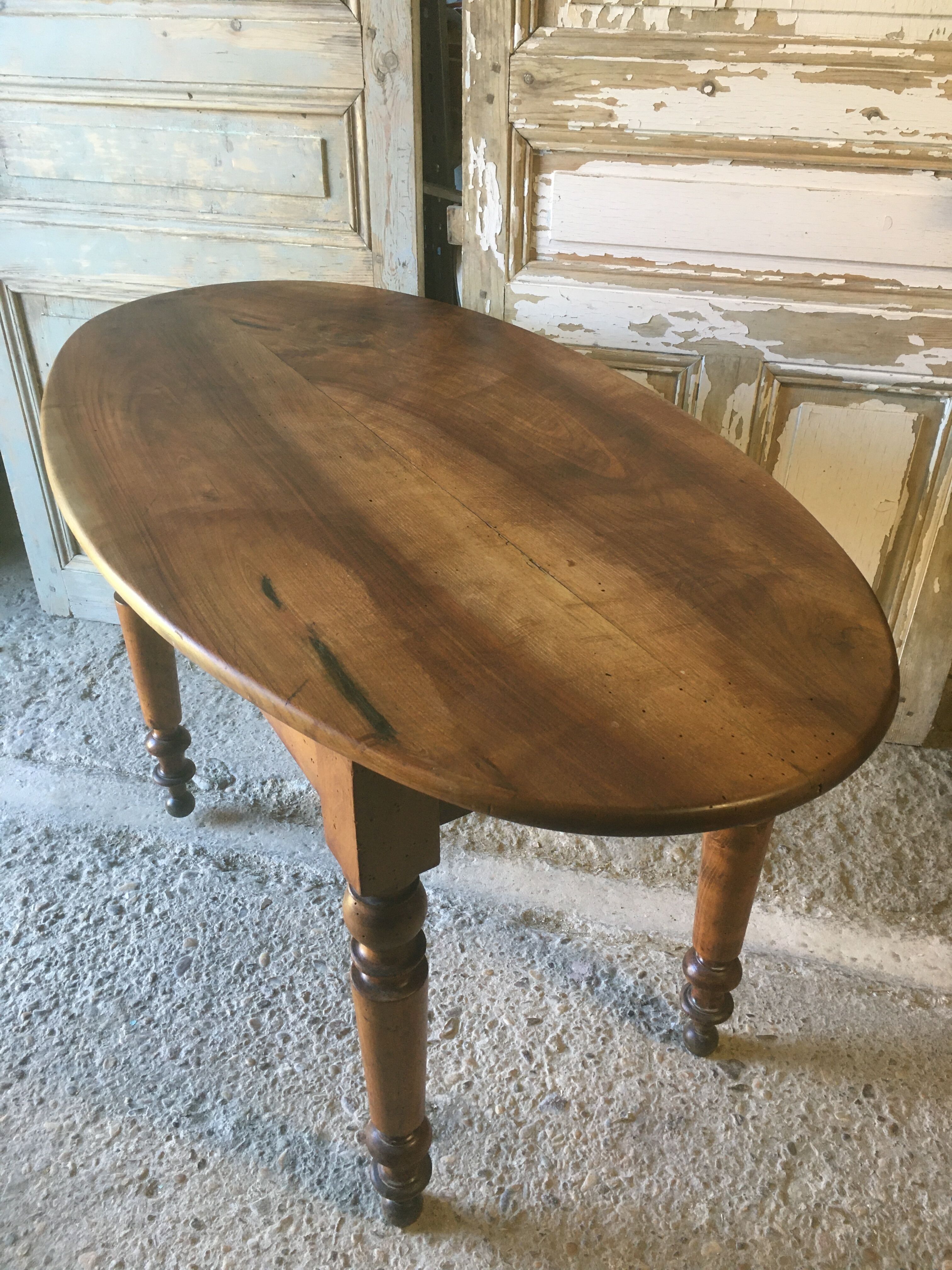 Oval walnut table