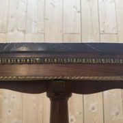 Oval Empire-style gueridon in walnut and marble.