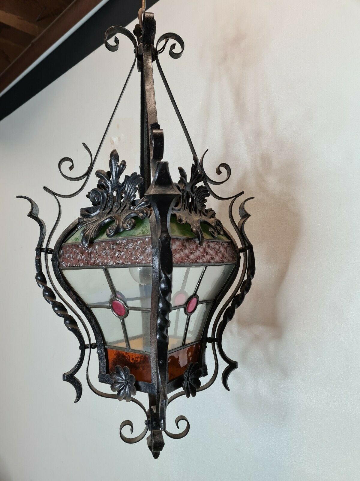Wrought iron lantern with stained glass