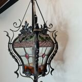Wrought iron lantern with stained glass