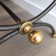 Coffee table in brushed steel and brass